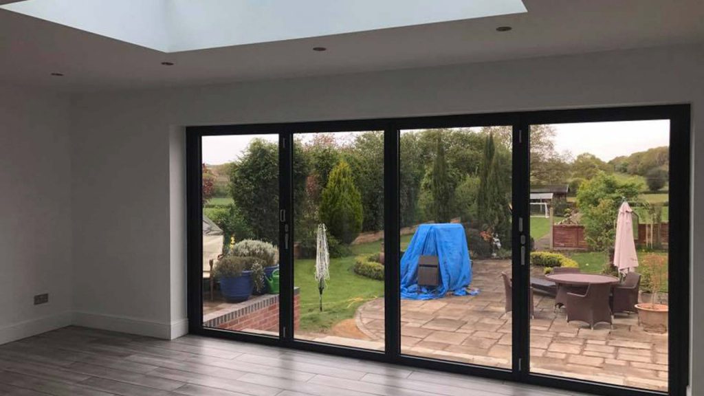 House extension Kenilworth Warwickshire interior kitchen folding doors.