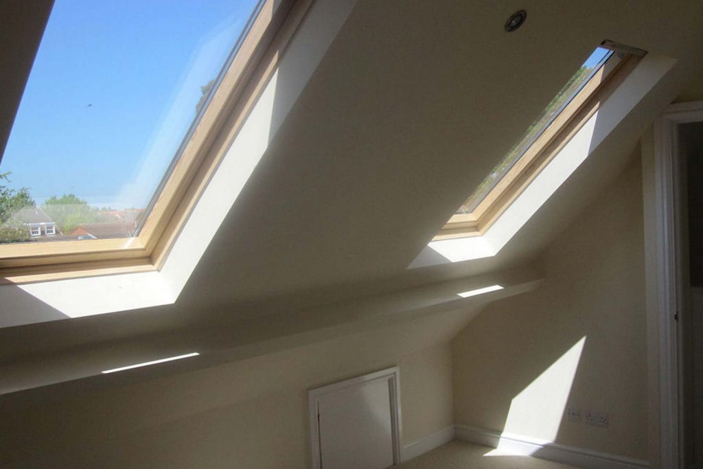 Loft conversion Kenilworth attic extension with skylights in to the roof space.