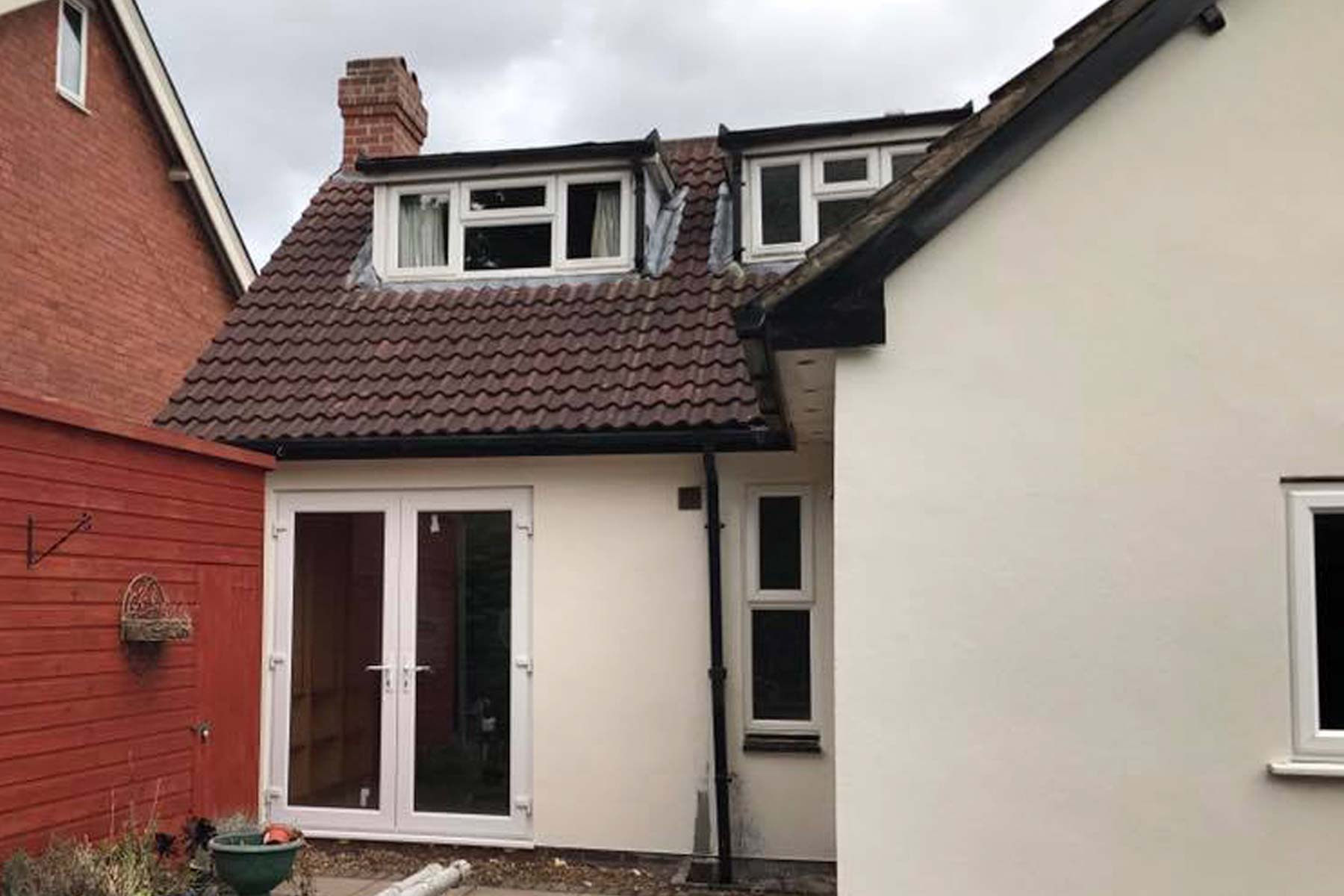 Loft conversion in a Kenilworth Warwickshire house attic with roof windows.