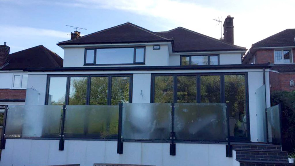 Rear house extension Kenilworth Warwickshire patio and sliding doors.